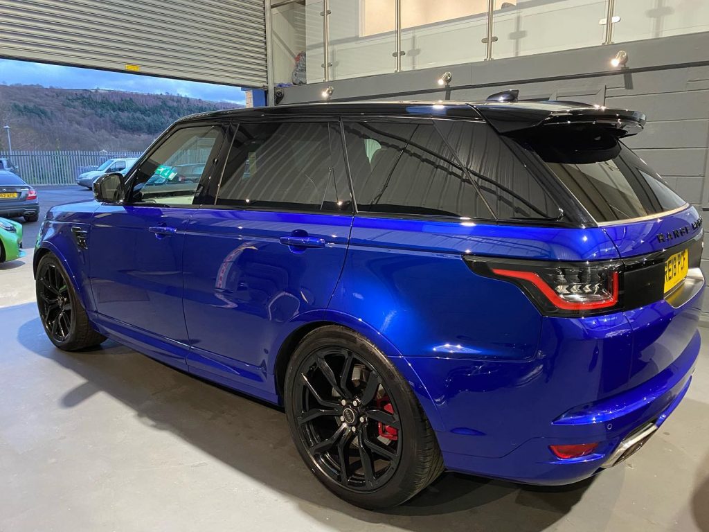 Vehicle Wrapping in Blue Metallic + Tinted Windows
